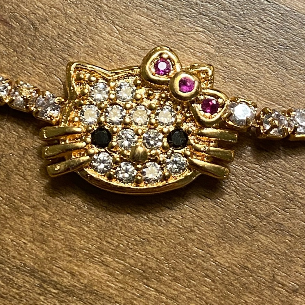 Hello Kitty Elegant Gold Inspired Bracelet with Pink Gem Accents - Picture 2 of 3